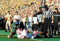 PASADENA, CA - JANUARY 02: Wide receiver Lavasier Tuinei #80 of the Oregon Ducks catches a three-yard touchdown pass in front of Marcus Cromartie #14 of the Wisconsin Badgers in the second quarter at the 98th Rose Bowl Game on January 2, 2012 in Pasadena, California. (Photo by Harry How/Getty Images)