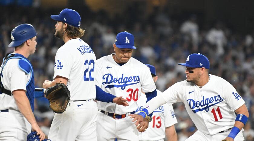 Los Angeles, CA - October 07: Clayton Kershaw is removed from the game after allowing 6 runs.