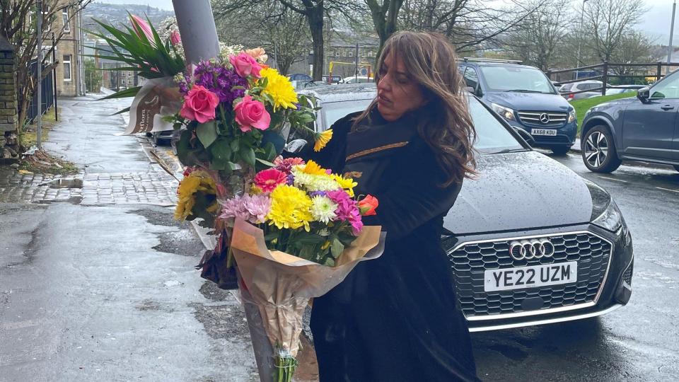 Labour MP Naz Shah lays flowers at the scene in Westgate, Bradford, after a 25-year-old man was arrested on suspicion of the murder of 27-year-old Kulsuma Akter, who was stabbed to death in the street as she pushed her baby in a pram on Saturday afternoon. The PA news agency understands the man arrested is Habibur Masum, who has been the subject of police appeals since Saturday. Picture date: Tuesday April 9, 2024.