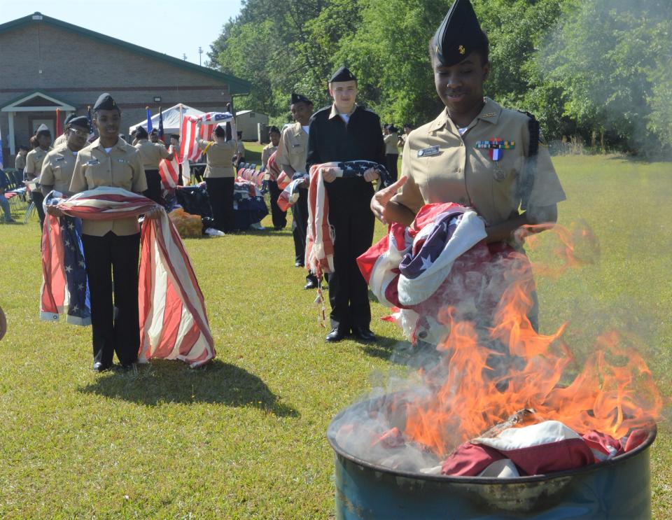 Scenes from the JCHS NJROTC flag retirement ceremony.