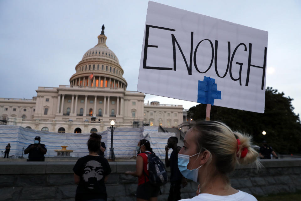 FILE - In this June 3, 2020, file photo, demonstrators protest the death of George Floyd, Wednesday, June 3, 2020, at the U.S. Capitol in Washington. It’s rare for public opinion on social issues to change sharply and swiftly. And yet in the wake of George Floyd’s death, polling shows dramatic movement in Americans’ opinions on police brutality and racial injustice. (AP Photo/Jacquelyn Martin, File)