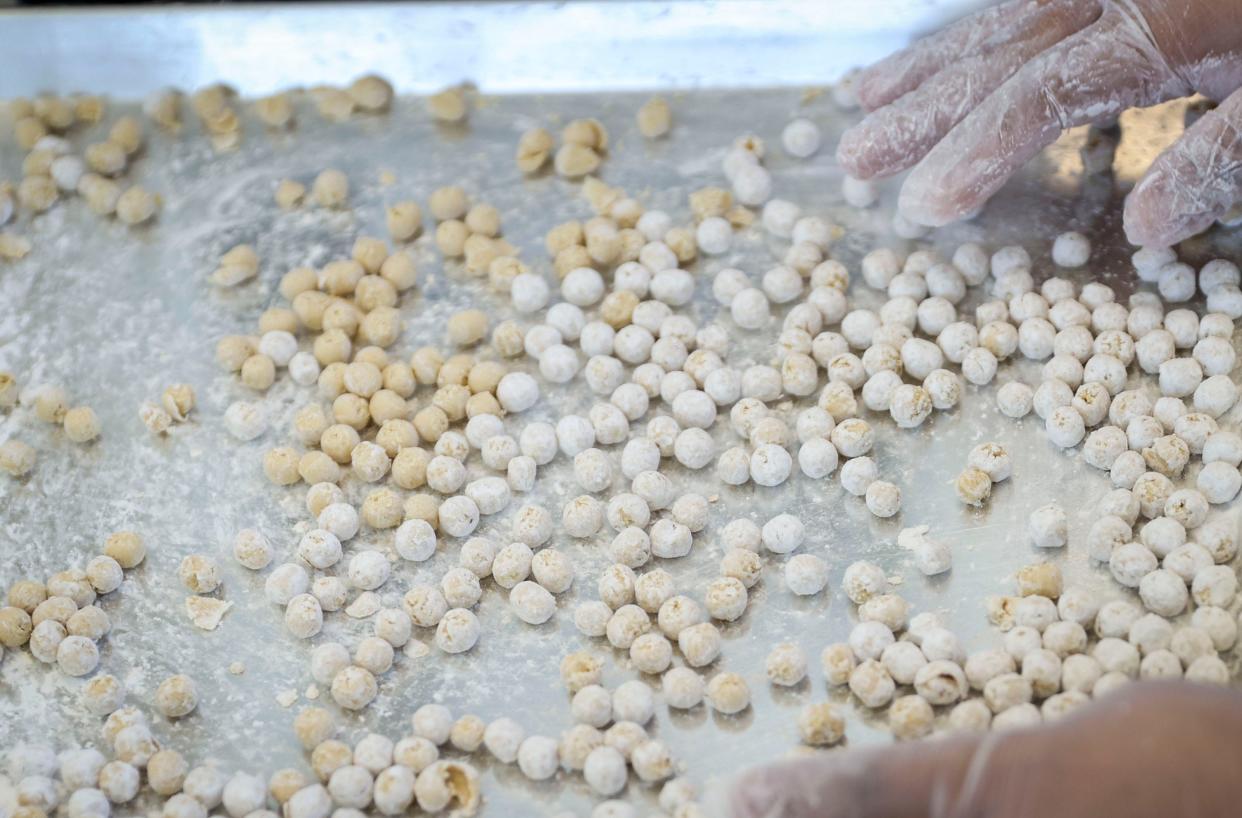 Vianey Rojas makes brown sugar boba at Bobadochi on Wednesday, April 10, 2024 in Salem, Ore.