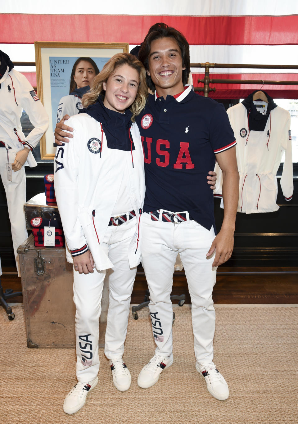 Skateboaders Jordyn Barratt, left, and Heimana Reynolds participate in the Team USA Tokyo Olympic closing ceremony uniform unveiling at the Ralph Lauren SoHo Store on April 13, 2021, in New York. Ralph Lauren is an official outfitter of the 2021 U.S. Olympic Team. (Photo by Evan Agostini/Invision/AP)