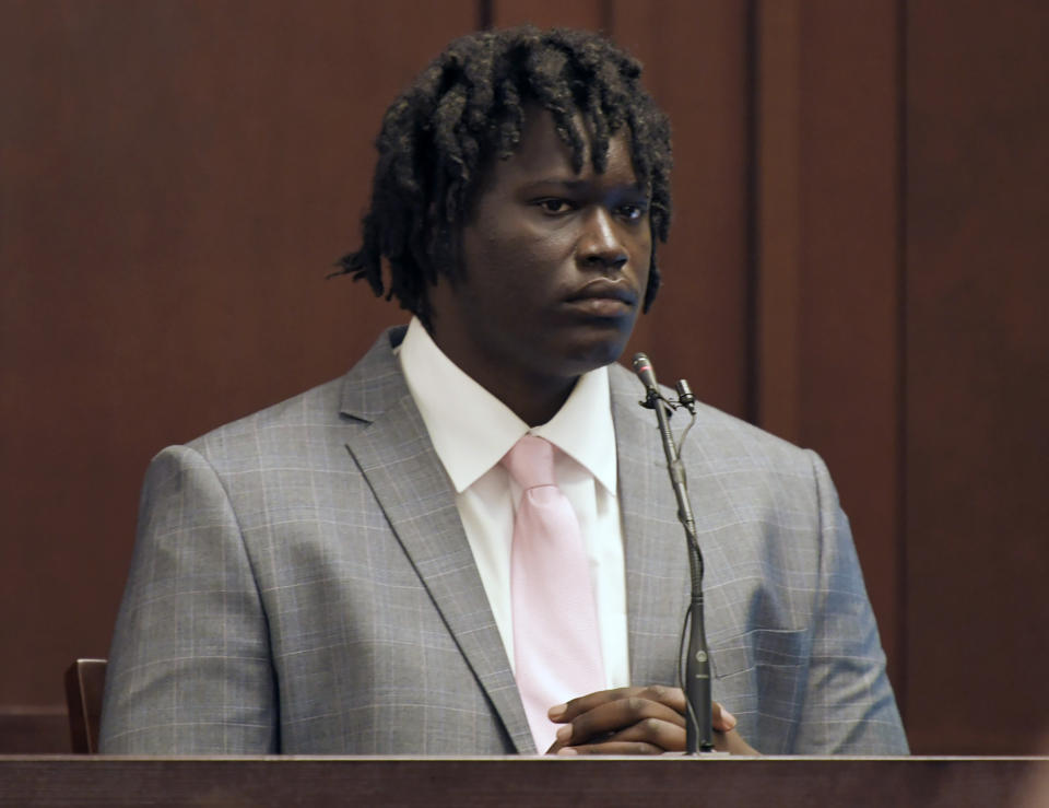 Emanuel Kidega Samson testifies in his own defense Wednesday, May 22, 2019, in Nashville, Tenn. Samson is accused of fatally shooting a woman and wounding seven people at a Nashville church in 2017. Prosecutors have said they're seeking life without parole for Samson. (Shelley Mays/The Tennessean via AP, Pool)