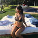 <p>Kylie celebrated the 2017 New Year in this matching choker and bikini combo. <em>[Photo: Instagram]</em> </p>