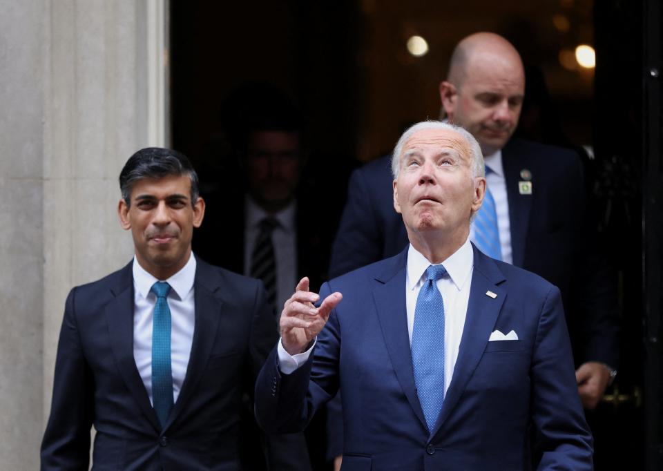 U.S. President Joe Biden gestures as he leaves 10 Downing Street (REUTERS)