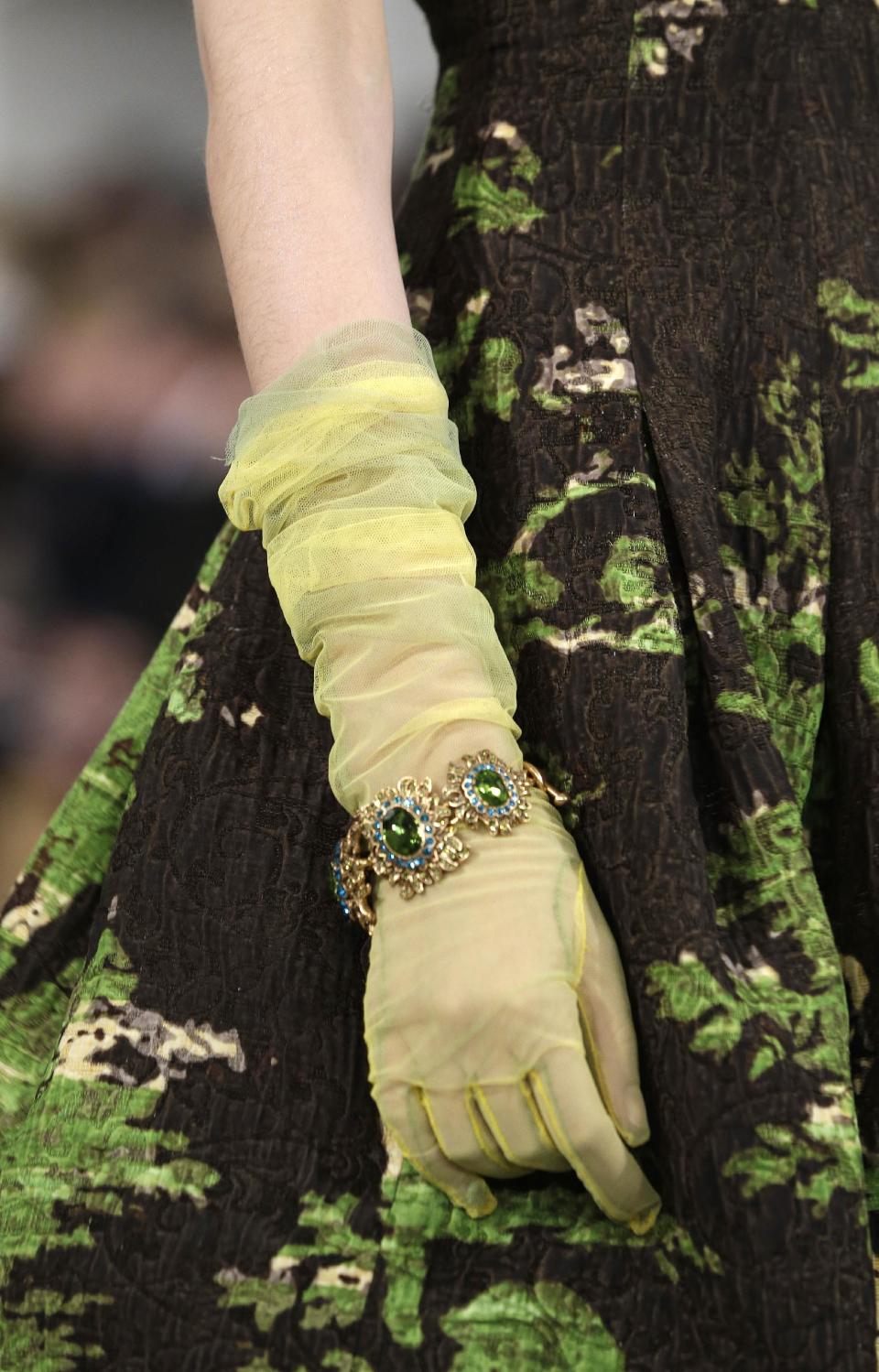 Fashion from the Oscar de la Renta Fall 2013 show is modeled during Fashion Week in New York, Tuesday, Feb. 12, 2013. (AP Photo/Kathy Willens)