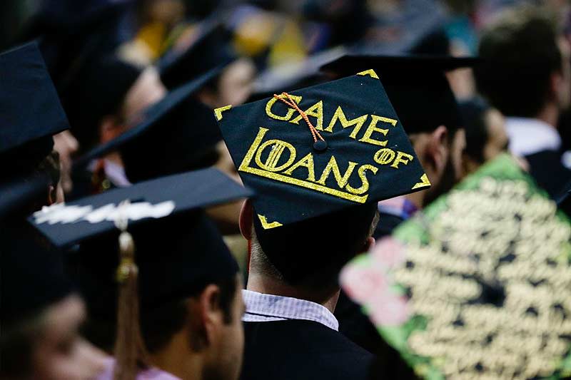 A graduating student at Ohio State's fall commencement made a humorous reference on his cap to his educational loans.