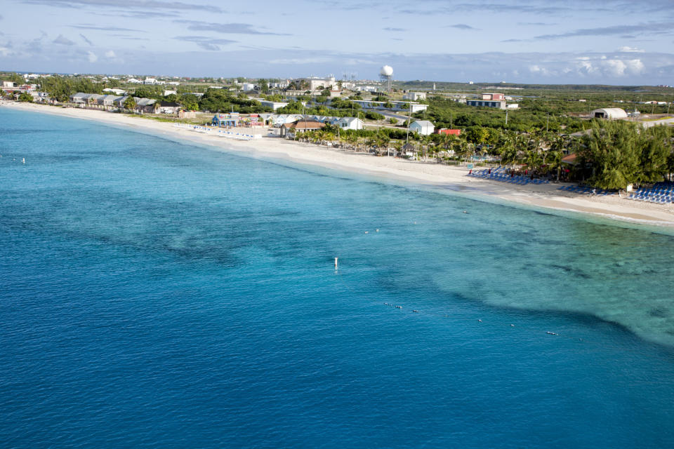 an empty beach and ocean