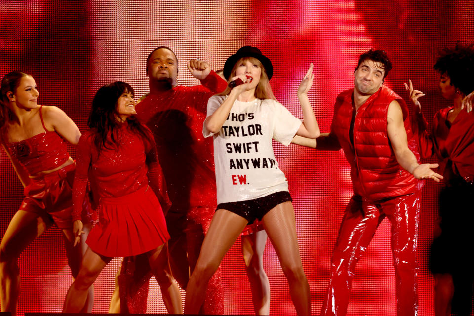 <p>Swift recreated her "22" music video outfit again for night two, thought this time the shirt featured a lyric from the song: "Who's Taylor Swift anyway? Ew."</p>