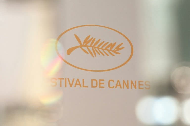 La flamme olympique des JO de Paris fera une apparition remarquée mardi sur le tapis rouge du 77e Festival de Cannes (Alain JOCARD)