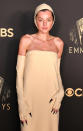<p><em>The Crown</em>'s Emma Corrin said the<a href="https://www.instagram.com/p/CUBYAwHqHqf/" rel="nofollow noopener" target="_blank" data-ylk="slk:inspiration behind their Miu Miu ensemble;elm:context_link;itc:0;sec:content-canvas" class="link "> inspiration behind their Miu Miu ensemble</a> was "crucible realness," and we're obsessed. Corrin's cut-out gloves revealed their black coffin claws, which added a hint of edge to an otherwise godly look.</p>