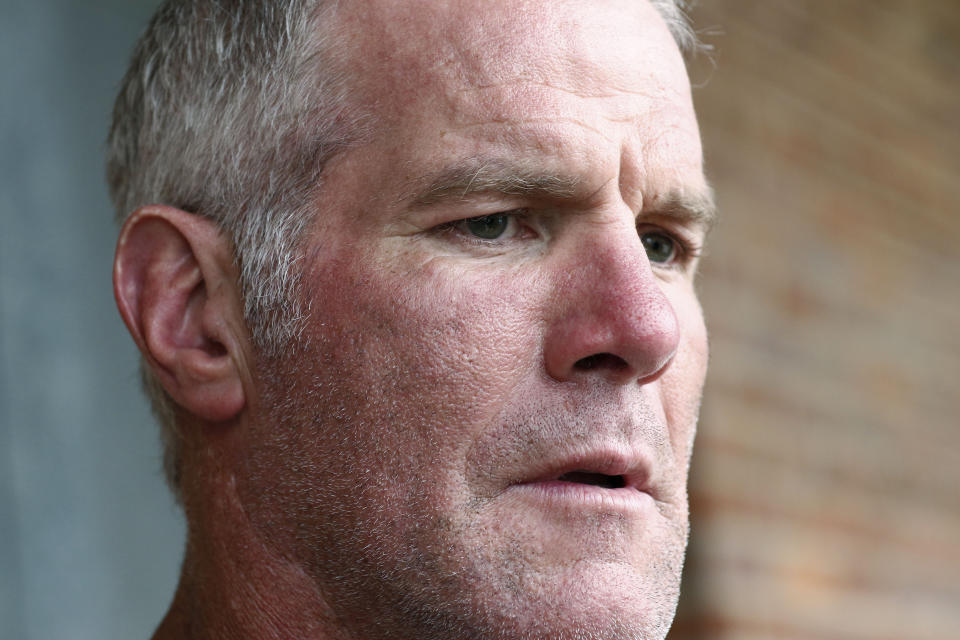 FILE - Retired NFL quarterback Brett Favre speaks to the media in Jackson, Miss., Oct. 17, 2018. Nancy New, who was convicted in 2022 in a welfare misspending case in Mississippi, said in a court filing Feb. 26, 2024, that former Mississippi Gov. Phil Bryant told people in 2019, during his final weeks of office, that he had been offered a financial stake in a company that had received welfare money for its effort to develop a concussion drug -- a company in which Favre was an investor. (AP Photo/Rogelio V. Solis, File)