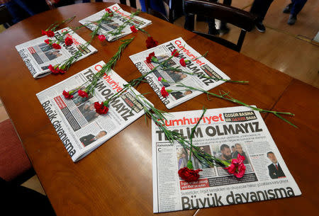 Carnations and today's copies are seen in the newsroom of Cumhuriyet newspaper, an opposition secularist daily, in Istanbul, Turkey, November 1, 2016. REUTERS/Murad Sezer