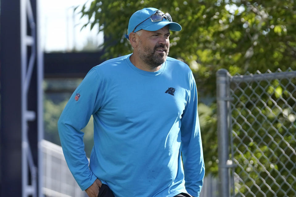 Carolina Panthers head coach Matt Rhule steps on the field at the start of an NFL football joint practice with the New England Patriots, Tuesday, Aug. 16, 2022, in Foxborough, Mass. (AP Photo/Steven Senne)