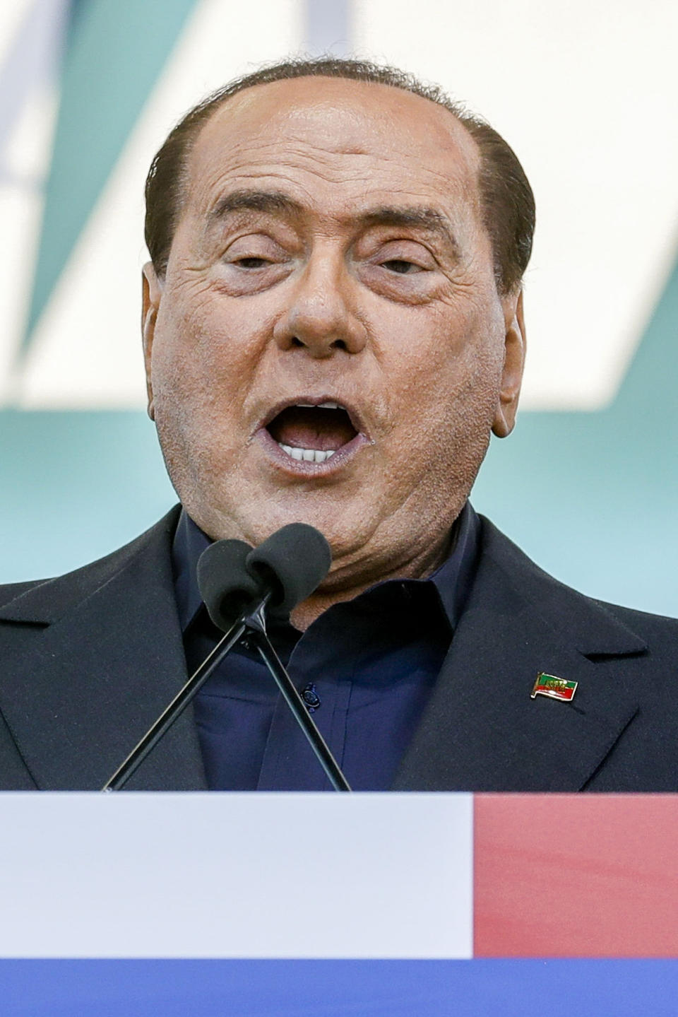 FILE - Silvio Berlusconi addresses a rally in Rome, Saturday, Oct. 19, 2019. With his 86th birthday on Sept. 29, and Forza Italia’s popularity shrinking in recent years, the former three-term premier is not gunning for a fourth term but instead hoping for a Senate seat. Italy will elect a new Parliament on Sept. 25. (AP Photo/Andrew Medichini, File)