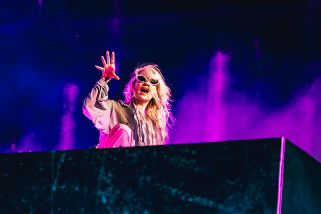 <p>Matt Winkelmeyer/Getty </p> Grimes performing at Coachella Weekend 1 in Indio, California on April 13, 2024