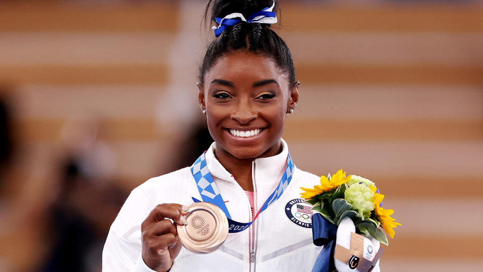 Despite withdrawing from aerial events at the Tokyo Olympics, Simone Biles earned bronze in the balance beam. (Photo by Jamie Squire/Getty Images)