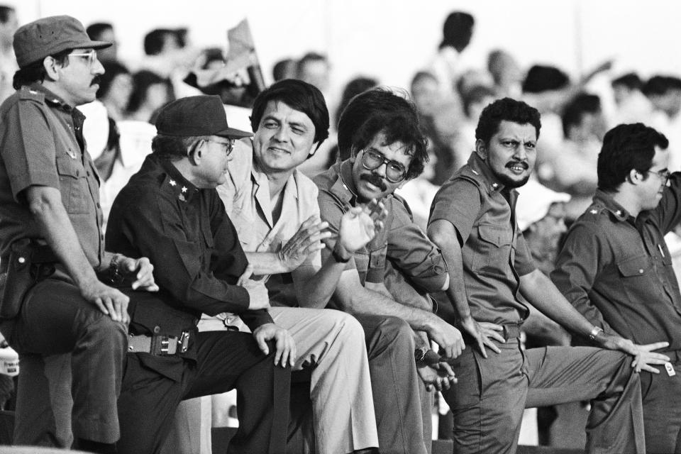 Members of the Sandinista National Liberation Front directorate — Defense Minister Humberto Ortega, Interior Minister Tomas Borge, junta member Sergio Ramírez, junta member Daniel Ortega and political coordinator Bayardo Arce — before the final campaign for general elections in Managua, Nicaragua, on Nov. 2, 1984.  (Pat Hamilton / AP file)