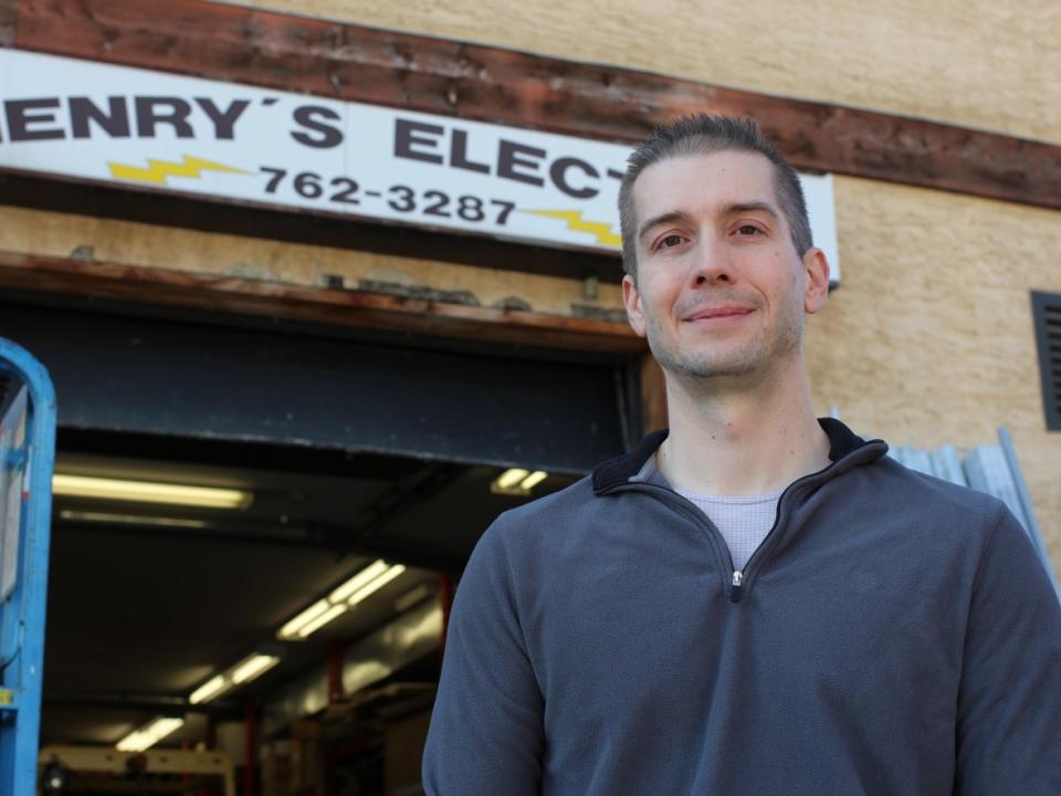 Matthew Simmonds, controller of Henry's Electric Service, says the high cost of housing has made it tough to retain staff.  (Paula Duhatschek/CBC - image credit)