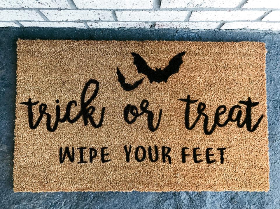 4) "Trick or Treat" Doormat