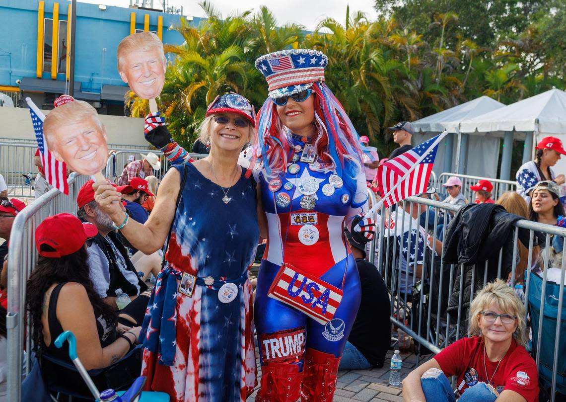 Kim Stevenson, left, of San Antonio and Micki Larson-Olson of Abilene traveled from Texas to support former President Donald Trump. They lined up early in the morning for his late-night appearance at the Ted Hendricks Stadium at Henry Milander Park in Hialeah, on Wednesday, November 8, 2023. Larson-Olson was found guilty of unlawful entry onto public property at the U.S. Capitol on Jan. 6, 2021, and sentenced to 180 days in jail.