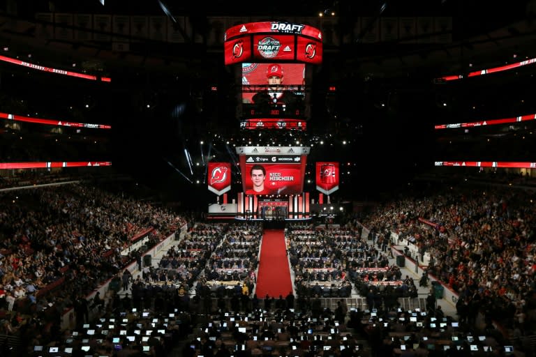 Nico Hischier is being selected first overall by the New Jersey Devils during the 2017 NHL Draft, at the United Center in Chicago, Illinois, on June 23