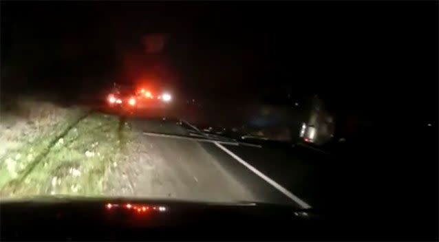 In the aftermath of the collision, debris can be seen scattered across the road. Photo: Dash Cam Owners Australia