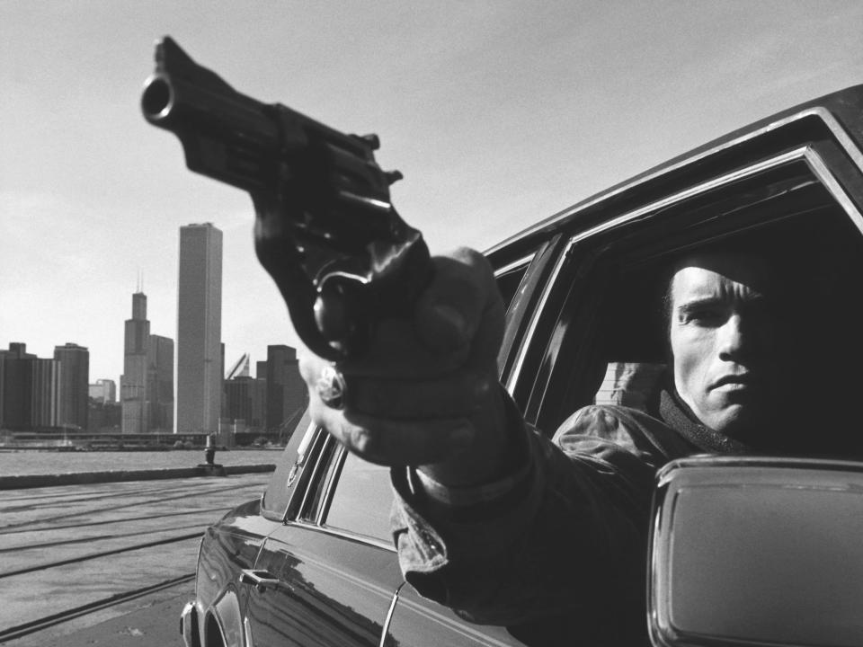 Arnold Schwarzenegger films a scene for the film "Raw Deal" in Chicago.