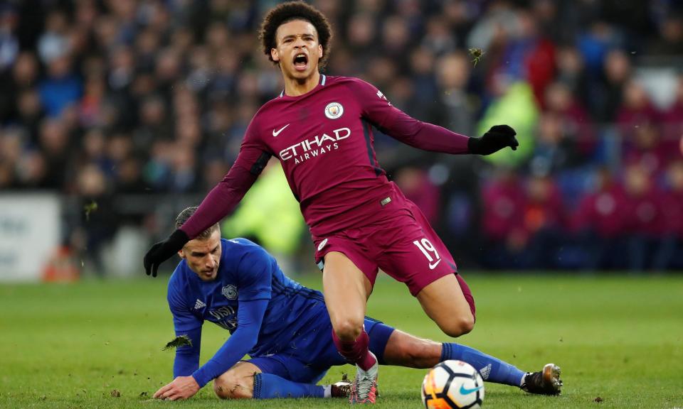 Leroy Sané is fouled by Cardiff City’s Joe Bennett. Sané did not reappear for the second half, leading Pep Guardiola to complain about lack of protection from referees.
