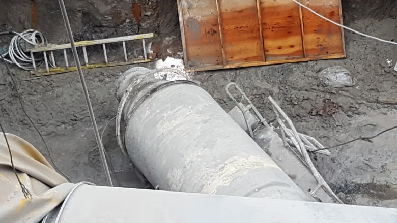 Construction crane topples at LRT tunnel entrance