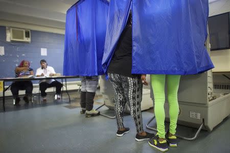 West Philadelphians casts their votes in a recreation center during the special primary election in Philadelphia, Pennsylvania on May 19, 2015. REUTERS/Mark Makela