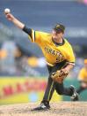 Jul 15, 2018; Pittsburgh, PA, USA; Pittsburgh Pirates relief pitcher Jimmy Anderson (52) pitches against the Milwaukee Brewers during the tenth inning at PNC Park. Pittsburgh won 7-6 in ten innings. Mandatory Credit: Charles LeClaire-USA TODAY Sports