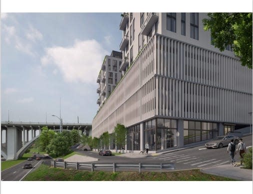 This rendering of Hill & Locust shows some of the latest updates, which were approved by the Design Review Board on June 20 after three months of discussion and public criticism. Among the revisions are the vertical metal fins covering the parking garage, illustrated here.