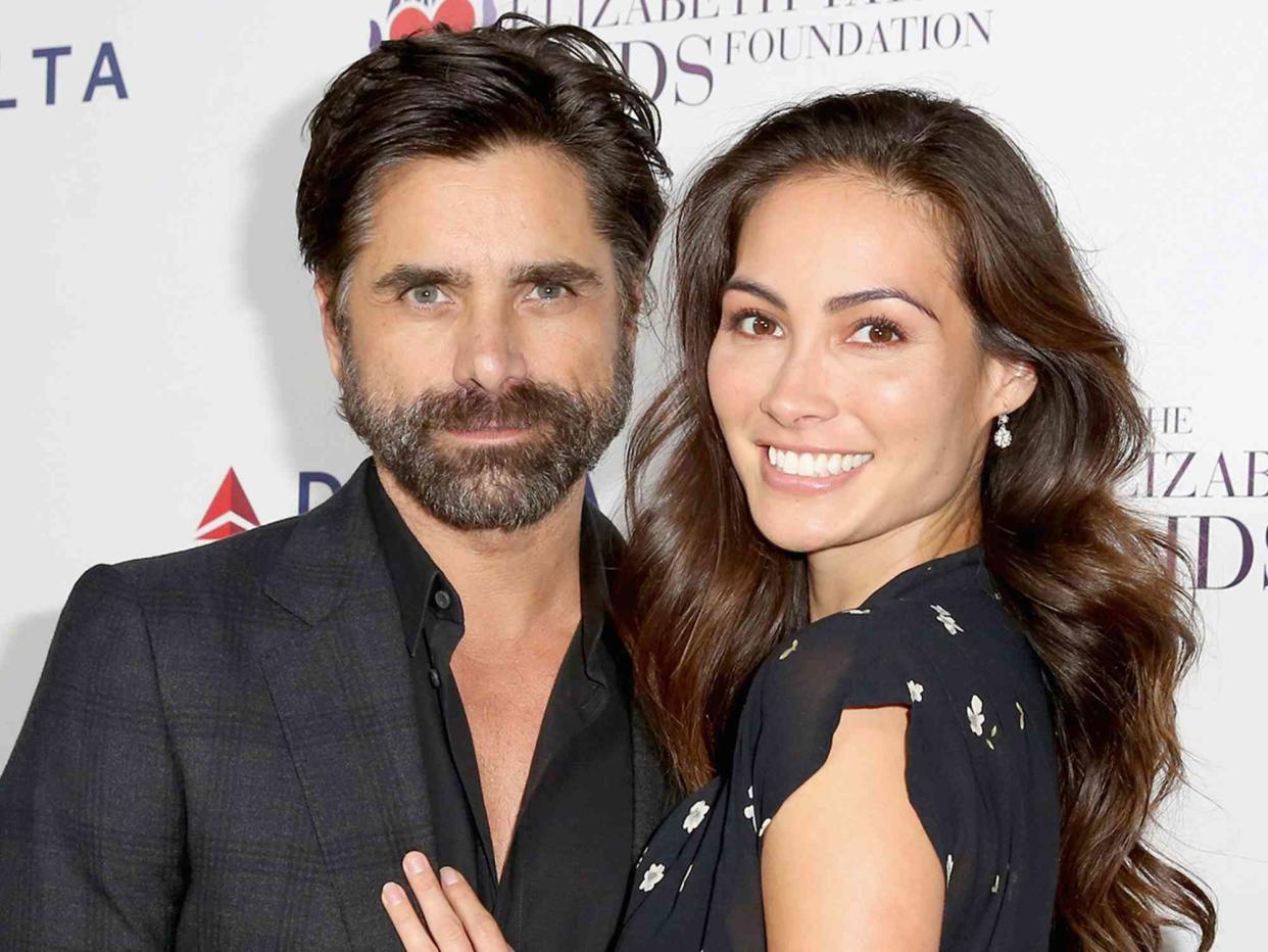 Rachel Murray/Getty John Stamos and Caitlin McHugh