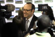 American actor Kevin Spacey speaks to the press as he arrives for the premiere of "Spirit Of A Denture" in Johannesburg, South Africa, Saturday, May 12, 2012. Spacey spoke about his international outlook during a brief visit to Johannesburg for the premiere of the South African short film he helped produce and in which he stars. (AP Photo/Denis Farrell)