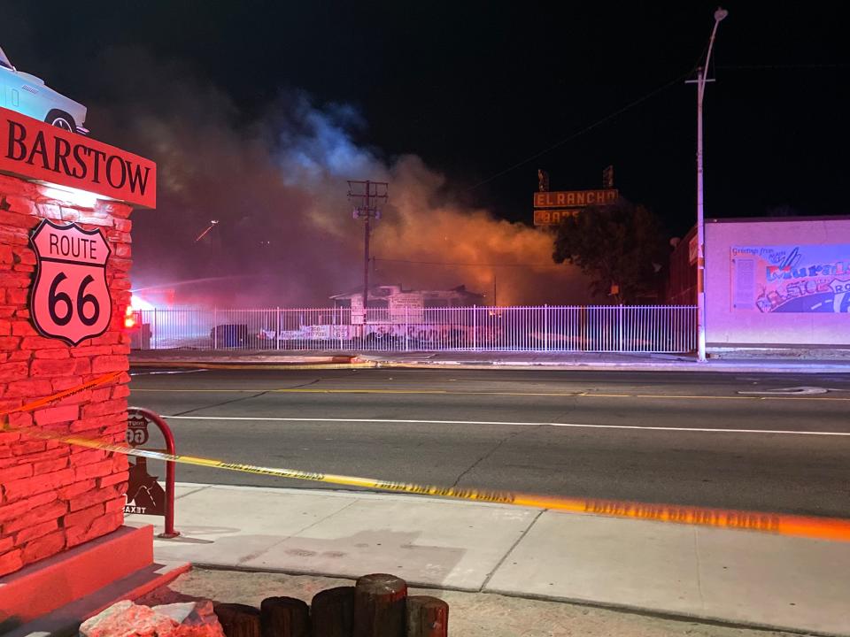 An inferno engulfed most of structure that makes up the more than 70-year-old El Rancho Motel on Main Street in Barstow on July 5, 2022, dousing its iconic “El Rancho Barstow” sign with smoke.
