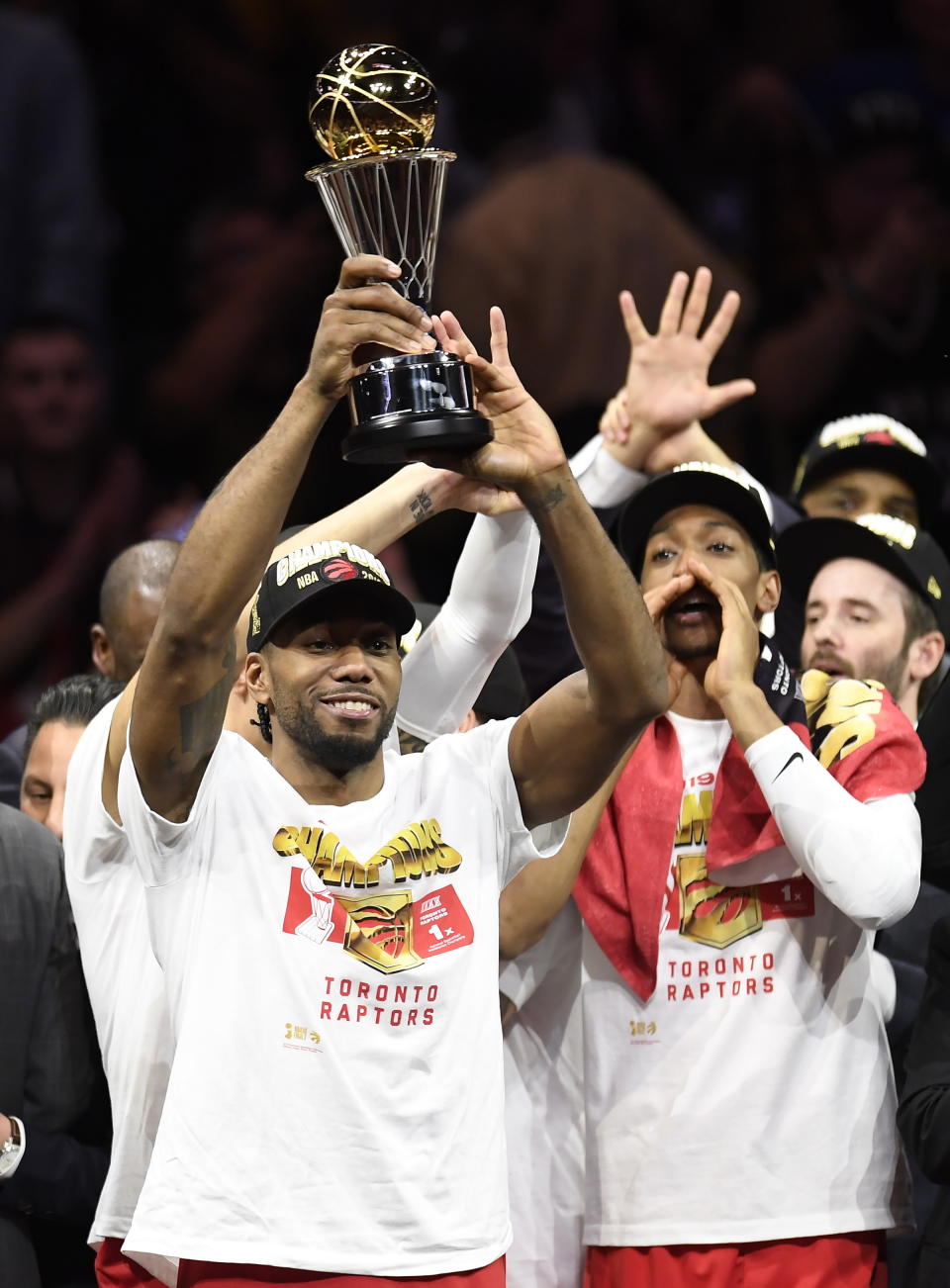 Toronto Raptors forward Kawhi Leonard holds the NBA Finals MVP trophy after the Raptors defeated the Golden State Warriors 114-110 in Game 6 of basketball’s NBA Finals, Thursday, June 13, 2019, in Oakland, Calif. (Frank Gunn/The Canadian Press via AP)