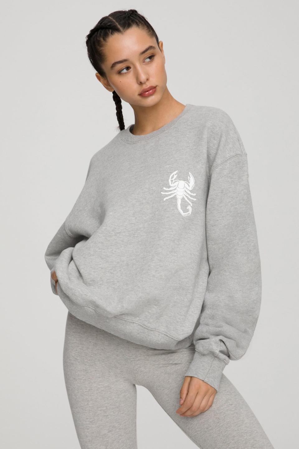 The Scorpio Zodiac Sweat Set from Good American. Sweatshirt, $124 and sweatpants, $105. 