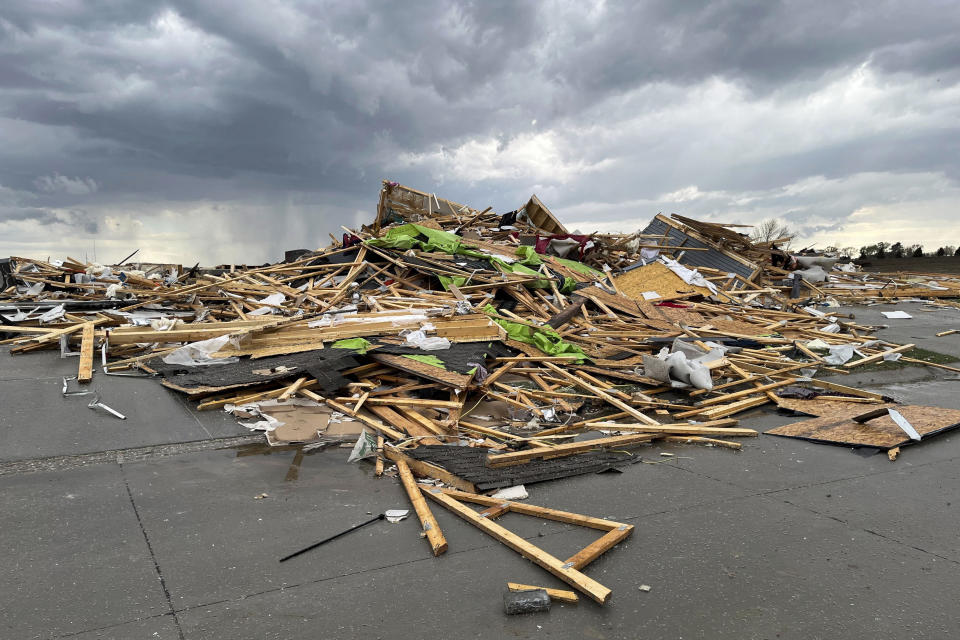 A destroyed home sits in a pile of debris after a storm tore through the northwest of Omaha, Neb., April 26, 2024. (AP Photo/Margery A. Beck)
