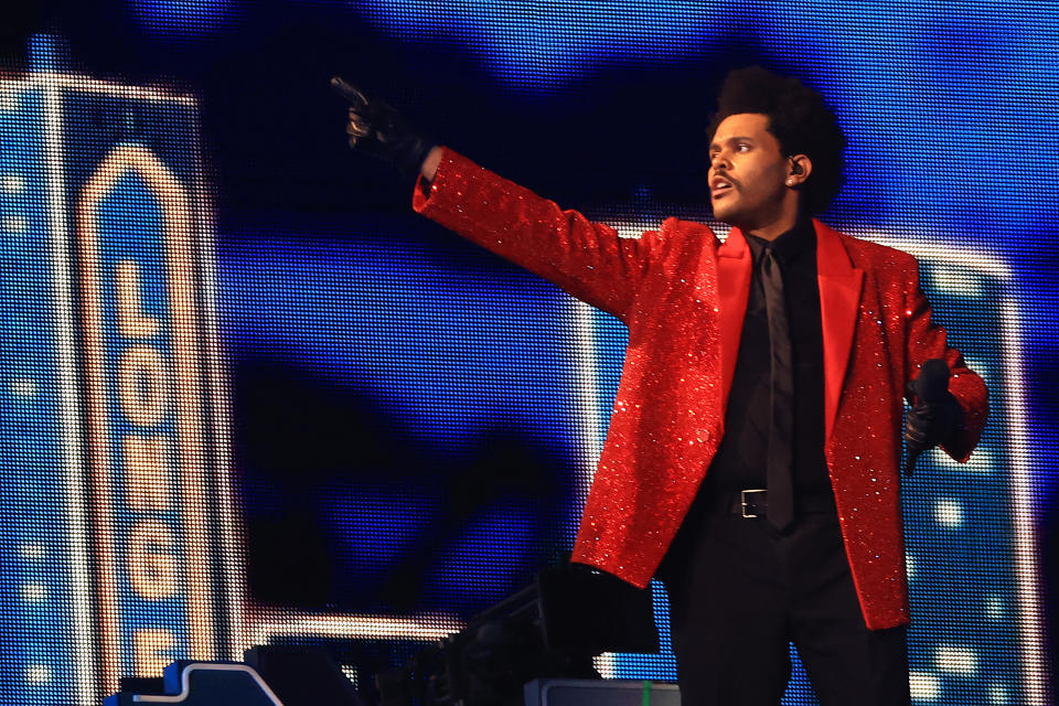 <p>TAMPA, FLORIDA - FEBRUARY 07: The Weeknd performs during the Pepsi Super Bowl LV Halftime Show at Raymond James Stadium on February 07, 2021 in Tampa, Florida. (Photo by Mike Ehrmann/Getty Images)</p> 