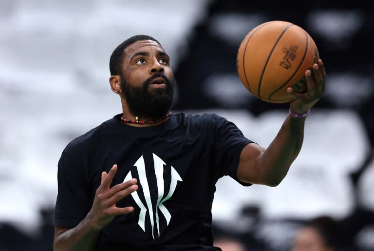 Dallas star <a class="link " href="https://sports.yahoo.com/nba/players/4840/" data-i13n="sec:content-canvas;subsec:anchor_text;elm:context_link" data-ylk="slk:Kyrie Irving;sec:content-canvas;subsec:anchor_text;elm:context_link;itc:0">Kyrie Irving</a> warms up before game two of the NBA Finals against <a class="link " href="https://sports.yahoo.com/nba/teams/boston/" data-i13n="sec:content-canvas;subsec:anchor_text;elm:context_link" data-ylk="slk:Boston;sec:content-canvas;subsec:anchor_text;elm:context_link;itc:0">Boston</a> (Adam Glanzman)