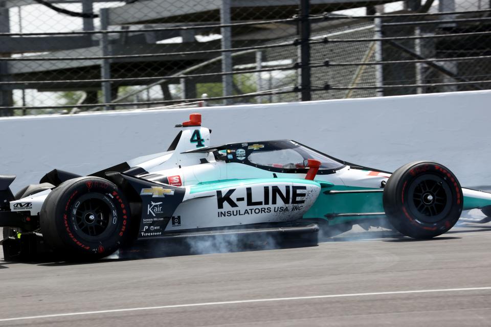 A. J. Foyt Enterprises driver Dalton Kellett (4) rolls into the short chute after crashing into the wall on turn one Monday, May 23, 2022, during practice for the 106th running of the Indianapolis 500 at Indianapolis Motor SpeedwayMonday, May 23, 2022, during practice for the 106th running of the Indianapolis 500 at Indianapolis Motor Speedway