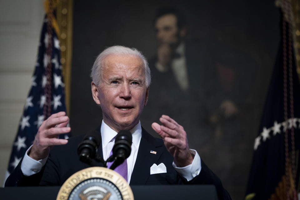 WASHINGTON, DC - JANUARY 26:  U.S. President Joe Biden speaks about the coronavirus pandemic in the State Dining Room of the White House on January 26, 2021 in Washington, DC. President Biden said his administration has secured commitments from vaccine makers Pfizer and Moderna to purchase another 200 million doses that will arrive this summer. (Photo by Doug Mills-Pool/Getty Images)