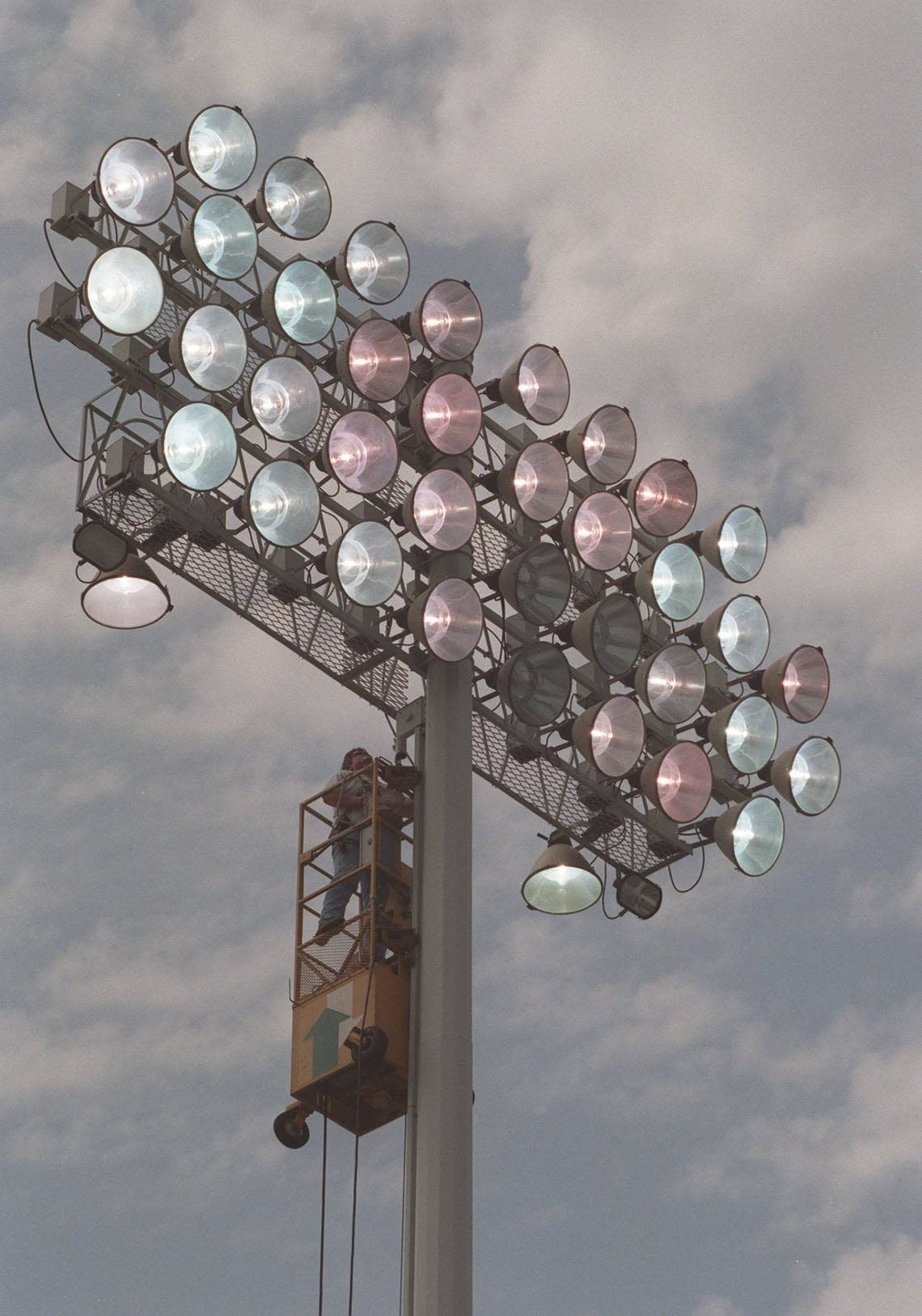 The installation of stadium lights was done to boost attendance and provide players relief from the heat of the daytime early in football seasons. CHARLES BERTRAM/Herald-Leader file photo
