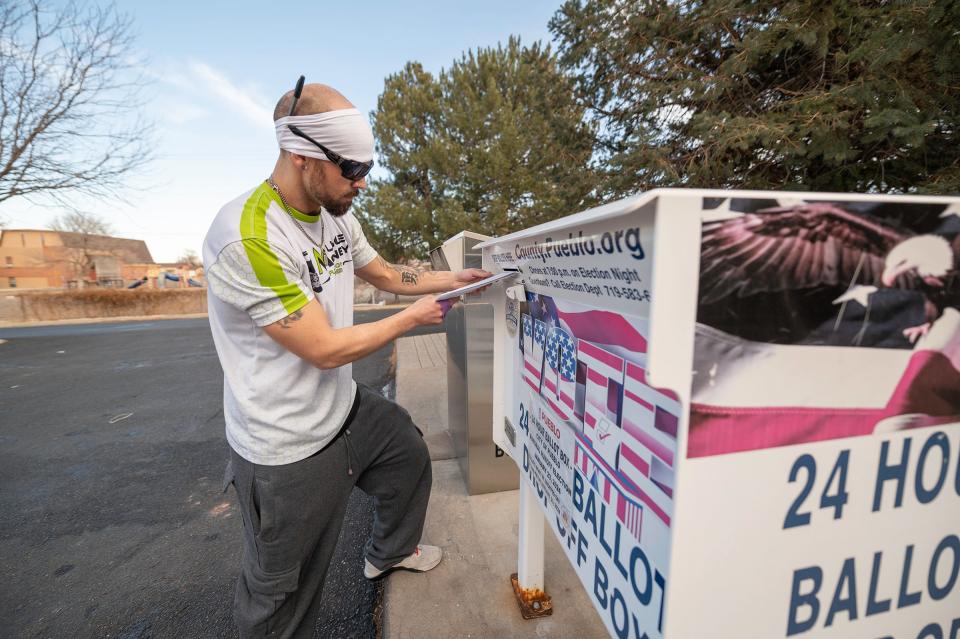 Sean Trinklein drops off ballots for the Pueblo mayoral runoff election on Tuesday, January 23, 2024.