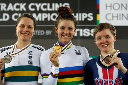 Cycling - UCI Track World Championships - Women's Individual Pursuit, Final - Hong Kong, China – 15/4/17 - Australia's Ashlee Ankudinoff, Chloe Dygert and Kelly Catlin of the U.S. celebrate with medals. REUTERS/Bobby Yip