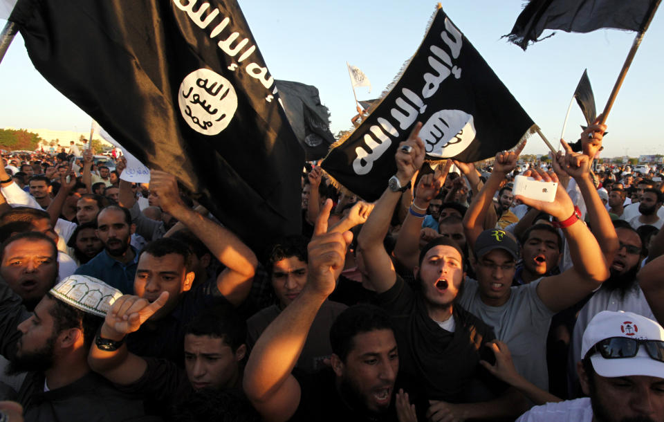 Followers of the Ansar al-Sharia group and other Islamic militias demonstrate against a film and a cartoon denigrating the Prophet Muhammad, Benghazi, Libya, Sept. 21, 2012. Some members of Ansar al-Sharia, one of Libya’s most powerful Islamic factions, later joined ISIS. (Photo: Mohammad Hannon/AP)