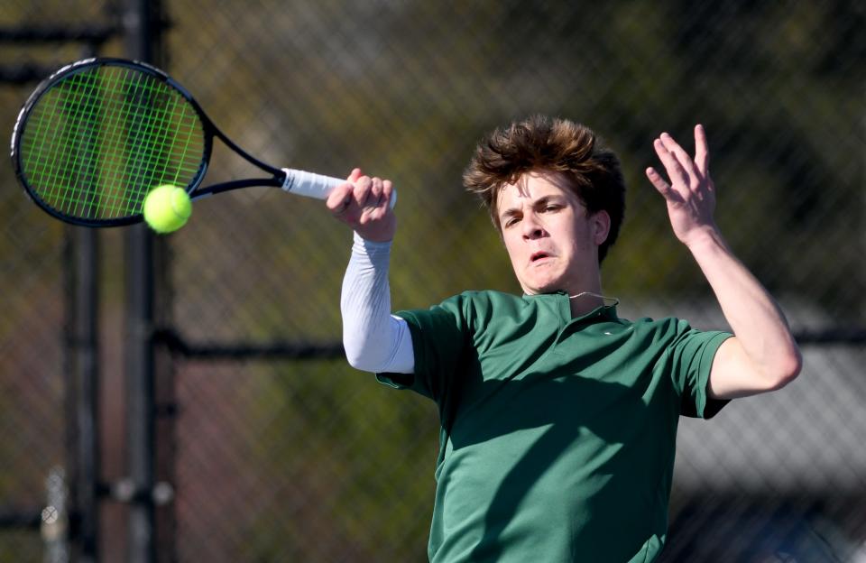 GlenOak's Dylan Wiles plays No. 1 singles against Hoover's Hunter Holloway on Monday.