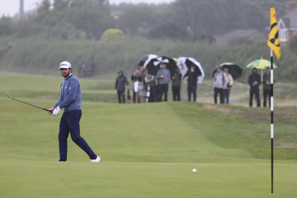 United States' Cameron Young watches his putt on the 10th green during the final day of the British Open Golf Championships at the Royal Liverpool Golf Club in Hoylake, England, Sunday, July 23, 2023. (AP Photo/Peter Morrison)